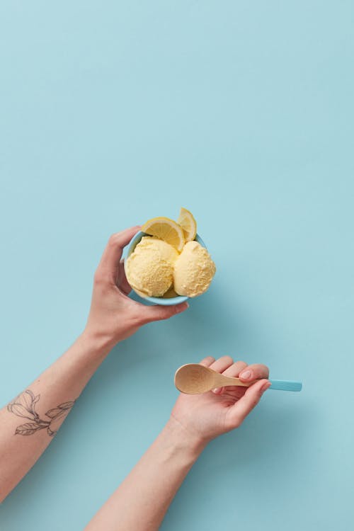 Lemon Slices Near the Yellow Ice Cream 