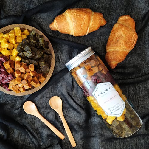 Overhead Shot of Croissants and Dried Fruits