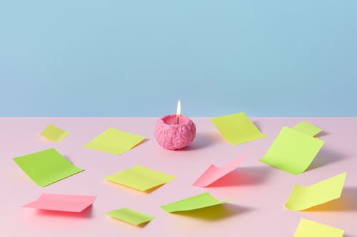 Pink Candle and Sticky Notes