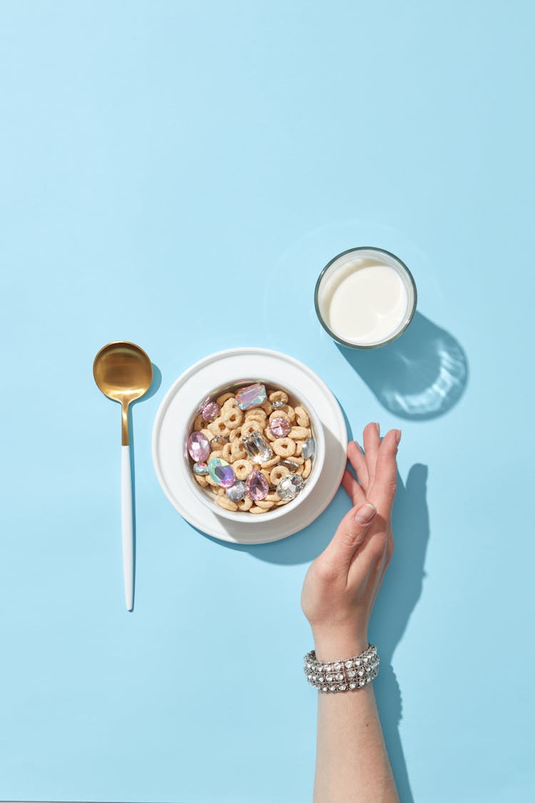 Bowl With Sugar Cereal And A Glass Of Milk 