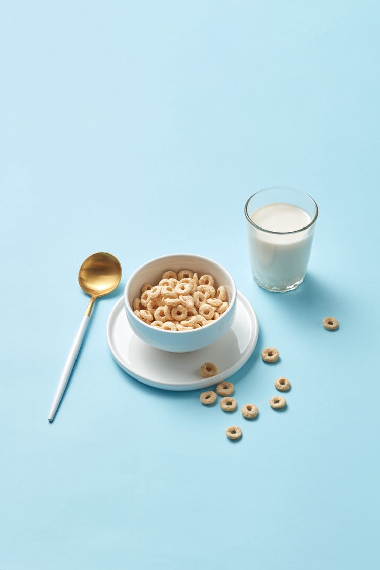 A Bowl Of Cereal And A Glass Of Milk