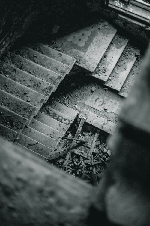 Free A hauntingly abandoned staircase captured in grayscale, St. Petersburg. Stock Photo