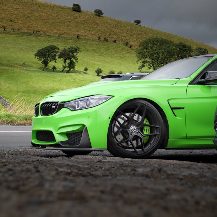 Green Bmw M3 Parked Near The Road 