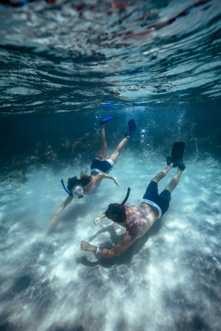 Man And Woman Snorkeling