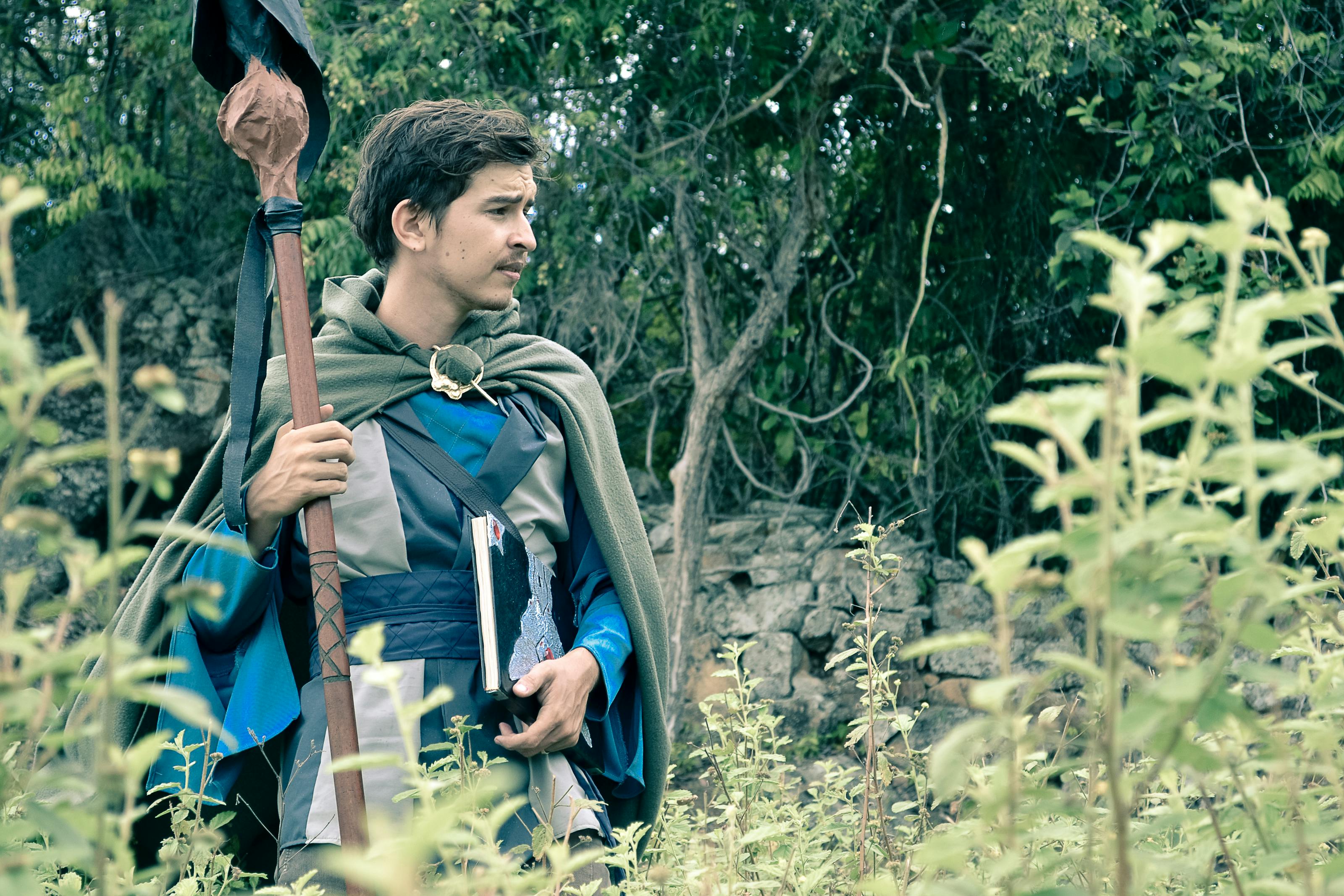 Man Wearing a Robe and Wielding a Staff · Free Stock Photo