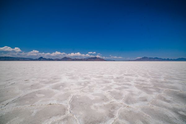 Cracked salt flat plain, photo by K on Pexels