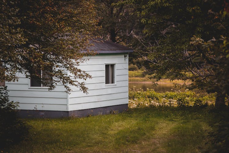 Small Country House In Green Garden