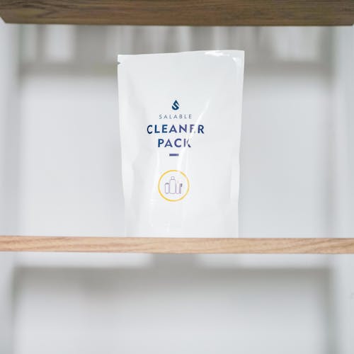 Free A Cleaner Pack on a Wooden Shelf Stock Photo