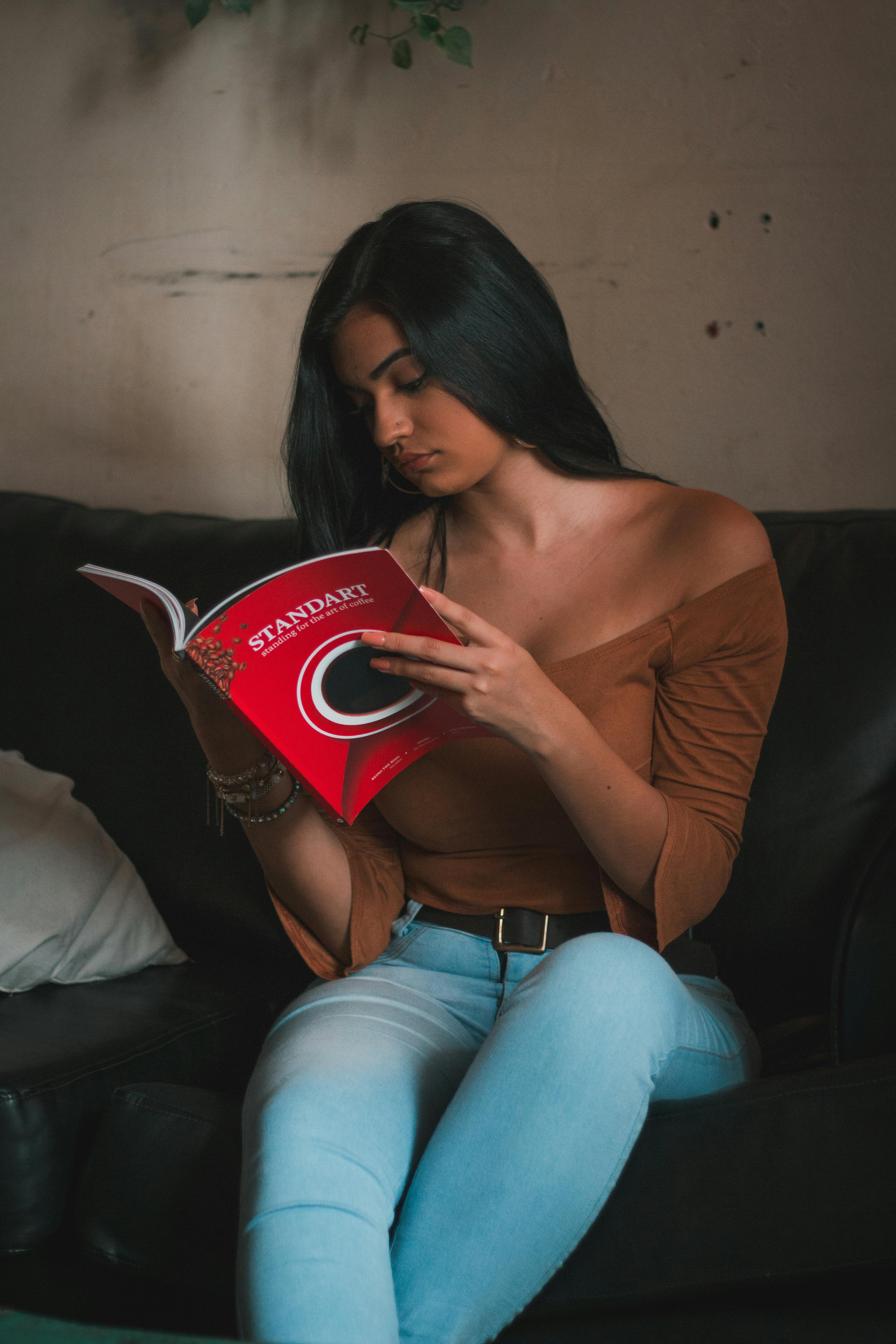 Free stock photo of magazine, reading, woman