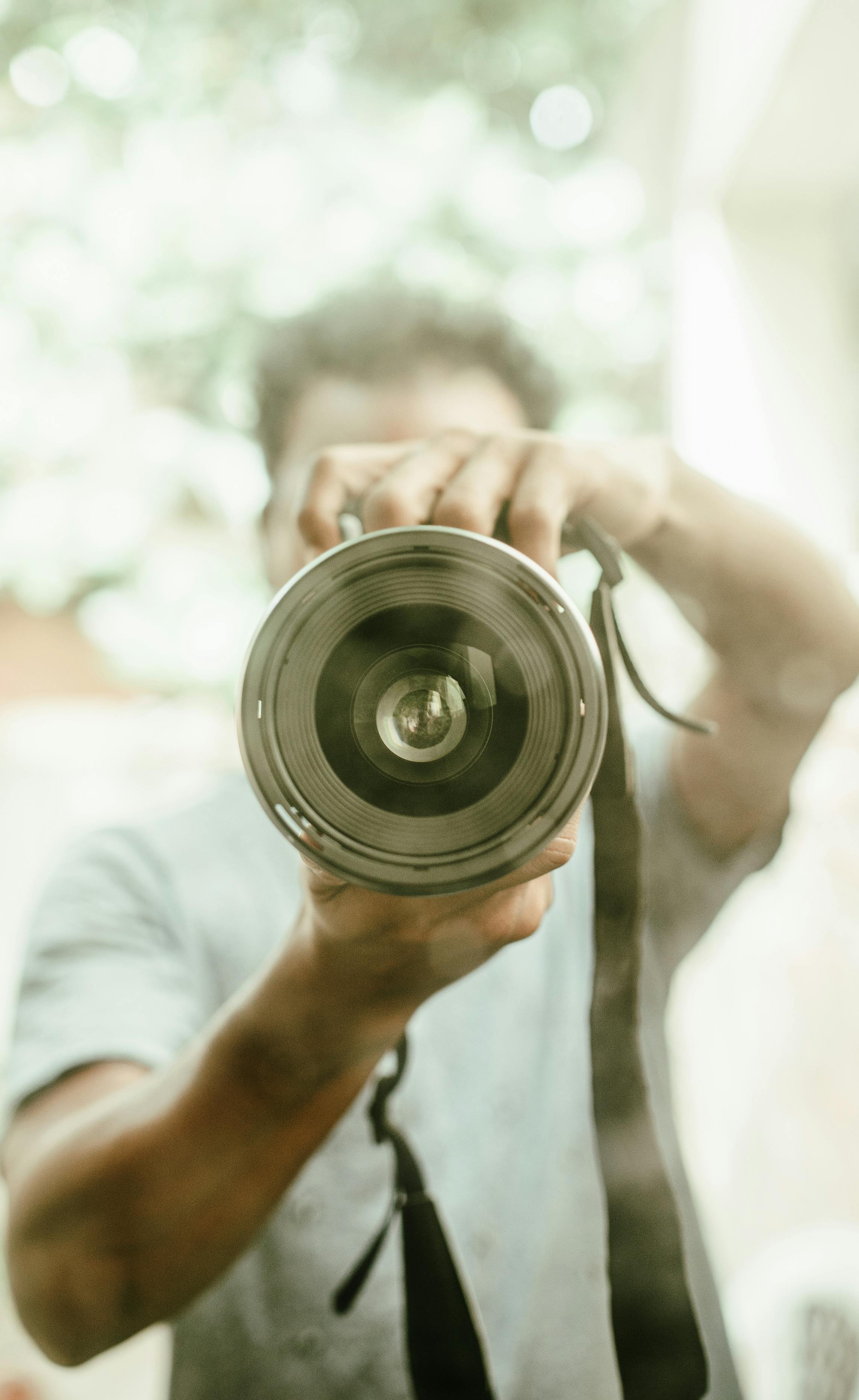 Person Holding Grey Point-and-shoot Camera · Free Stock Photo
