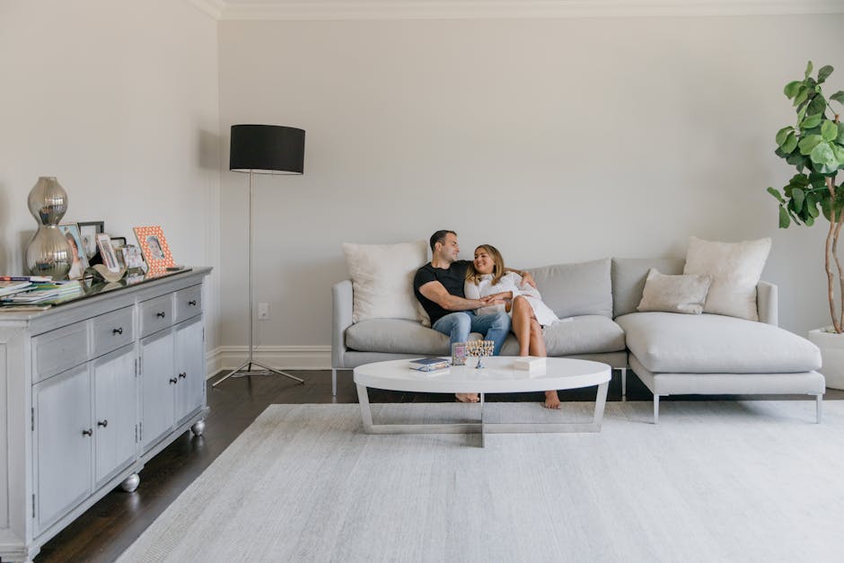 family relaxing comfortably indoors on a couch in a well-sealed home - home air sealing calabasas ca family relaxing comfortably indoors on a couch in a well-sealed home - home air sealing calabasas ca