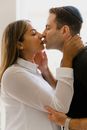 A Portrait of a Couple Kissing