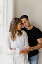 A Couple Holding Each Other Close