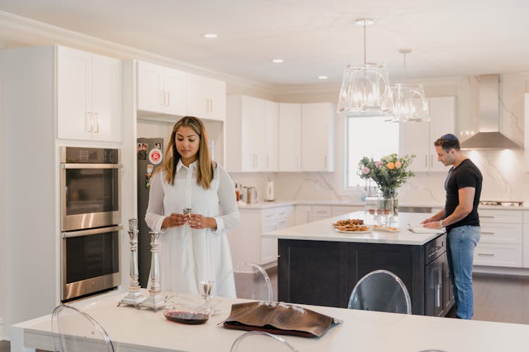 Woman And Man In Kitchen