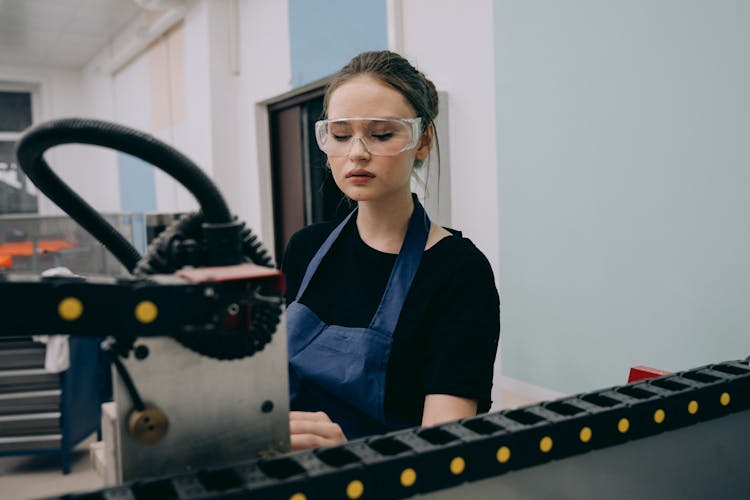 Beautiful Woman Inside A Factory