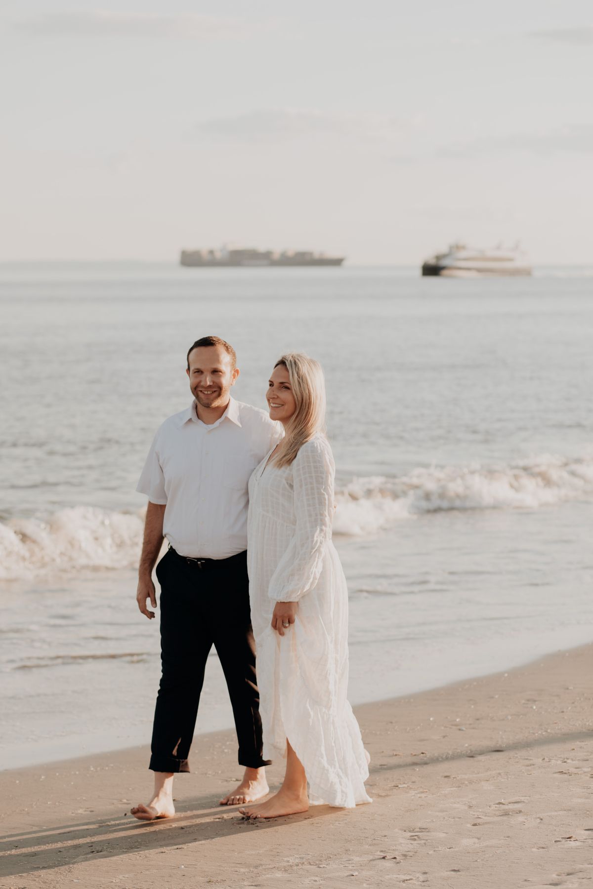 Couple walking together at beach showing partnership