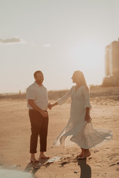 A Couple Walking on the Seashore