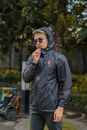 Man in Black Leather Jacket Wearing Black Framed Eyeglasses