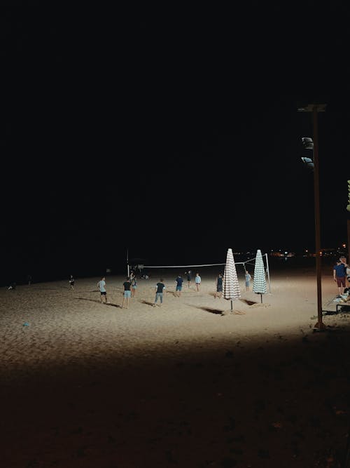 Ilmainen kuvapankkikuva tunnisteilla hiekkaranta, ihmiset, ilta