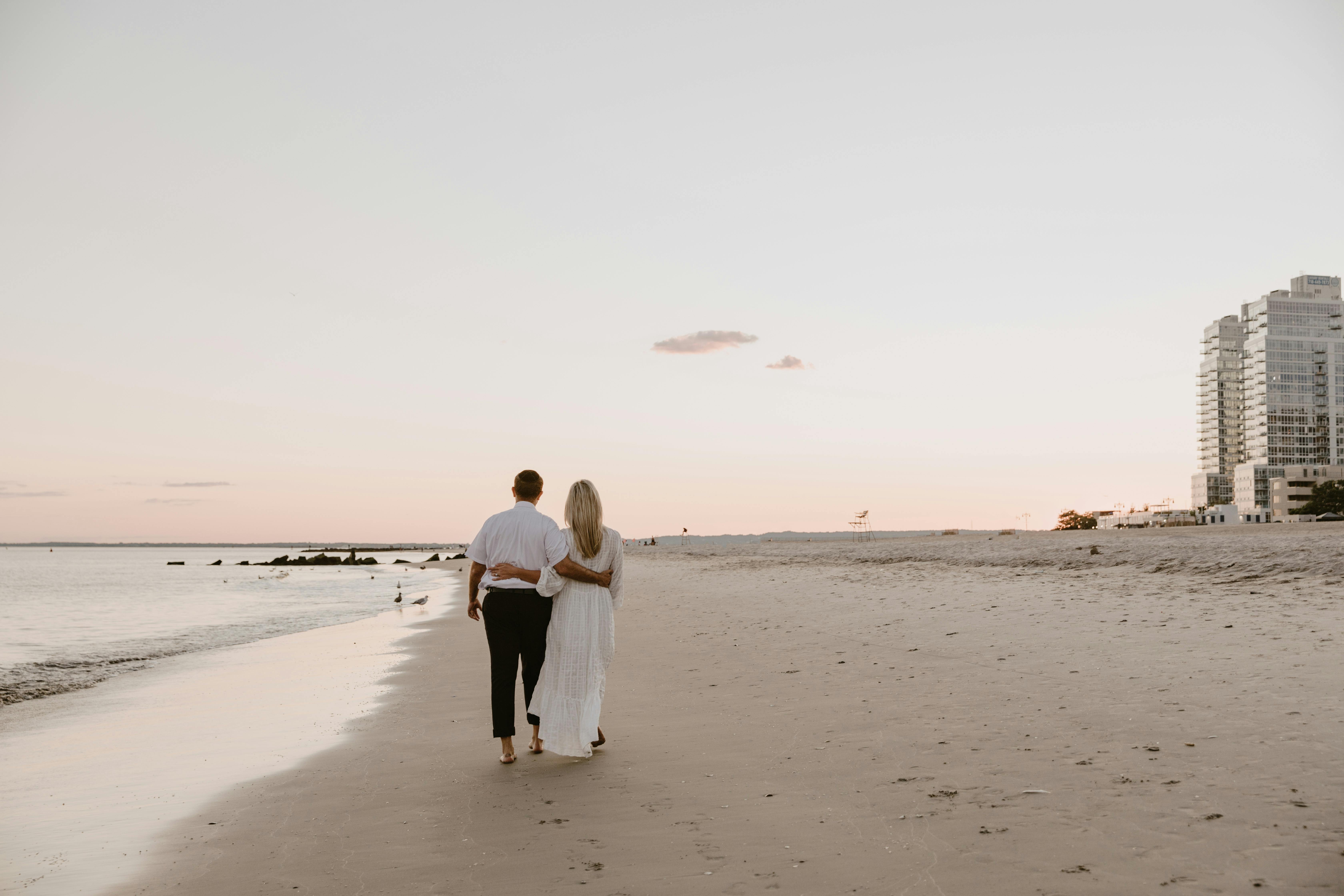 Family and couple enjoying Easter vacation by the beach