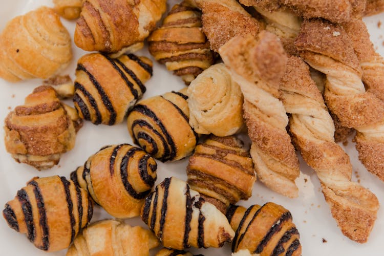 Assorted Pastries On A White Surface