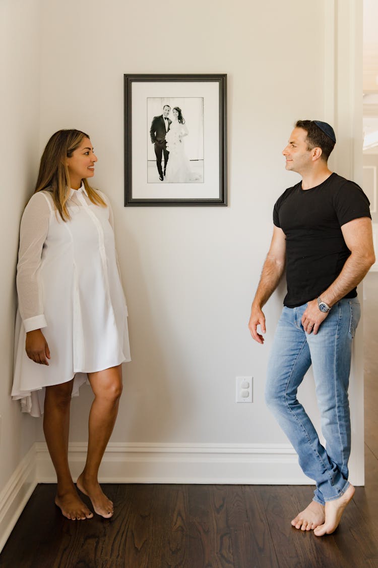 Wedding Picture Frame Between A Couple Standing