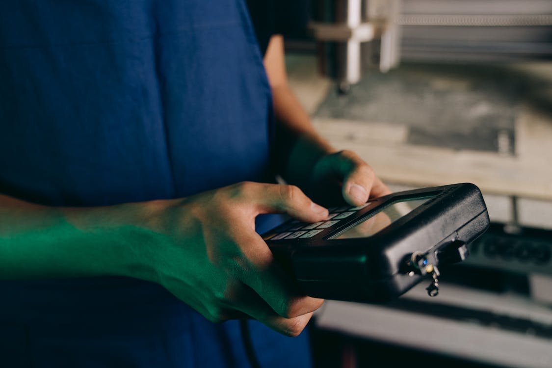 Close-up Photo of a CNC Router held by a Person · Free Stock Photo
