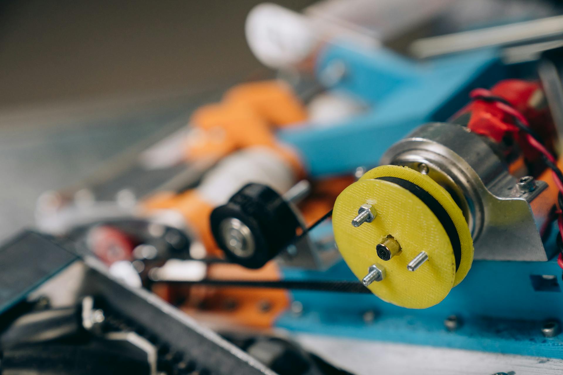 Detailed view of machine gears and components, focusing on engineering elements.