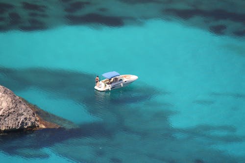 Free stock photo of boat, island, mirror effect Stock Photo