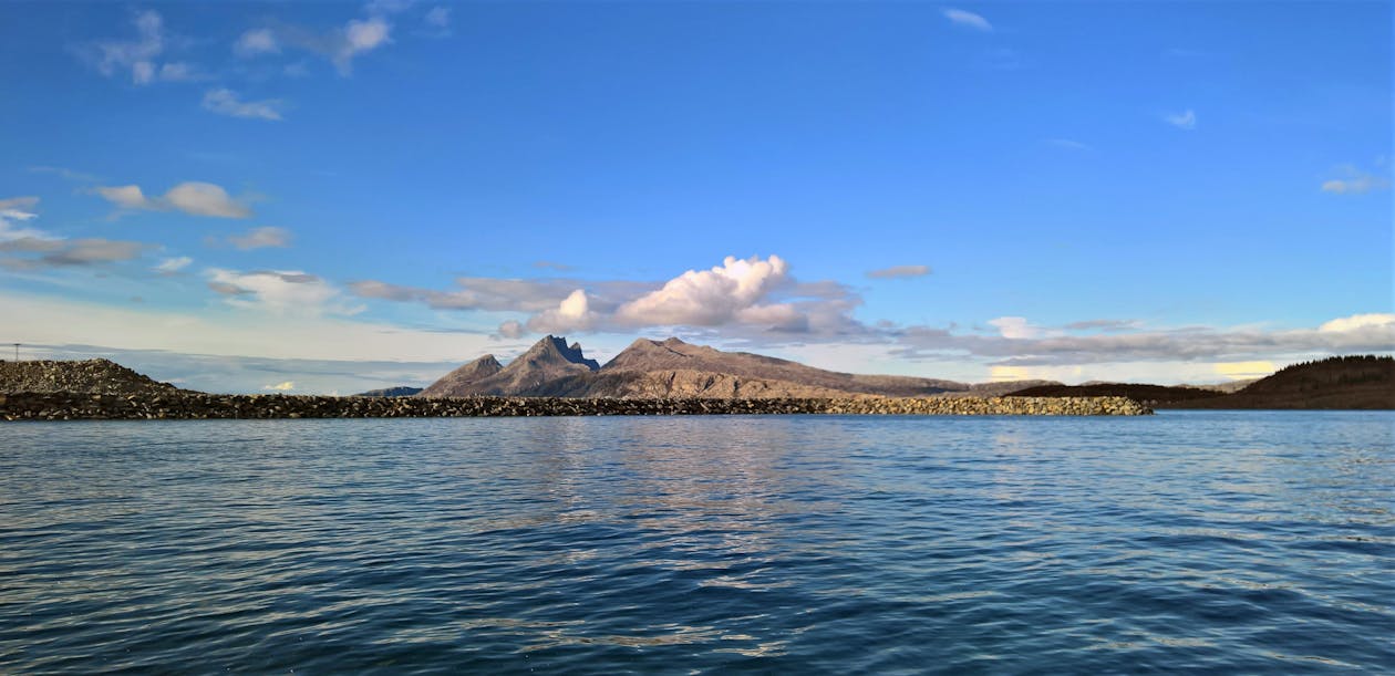 Landscape Photography of Mountain Near Body of Water