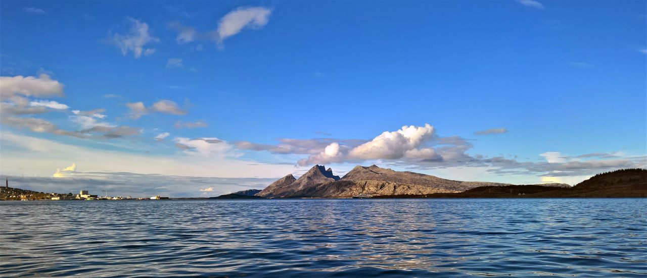breathtaking ocean view with mountains under a clear blue sky in alsta