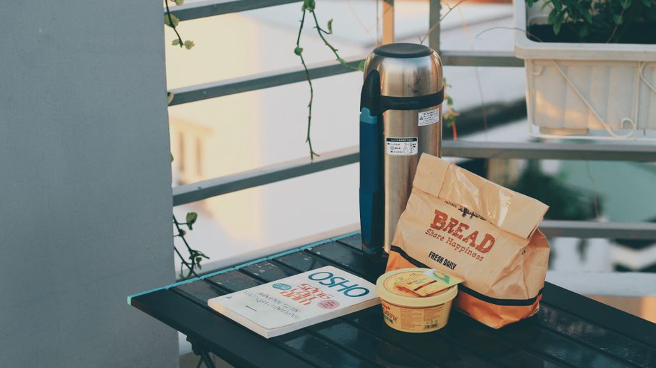 bag and notebook by the door everyday scene lifestyle photo 1