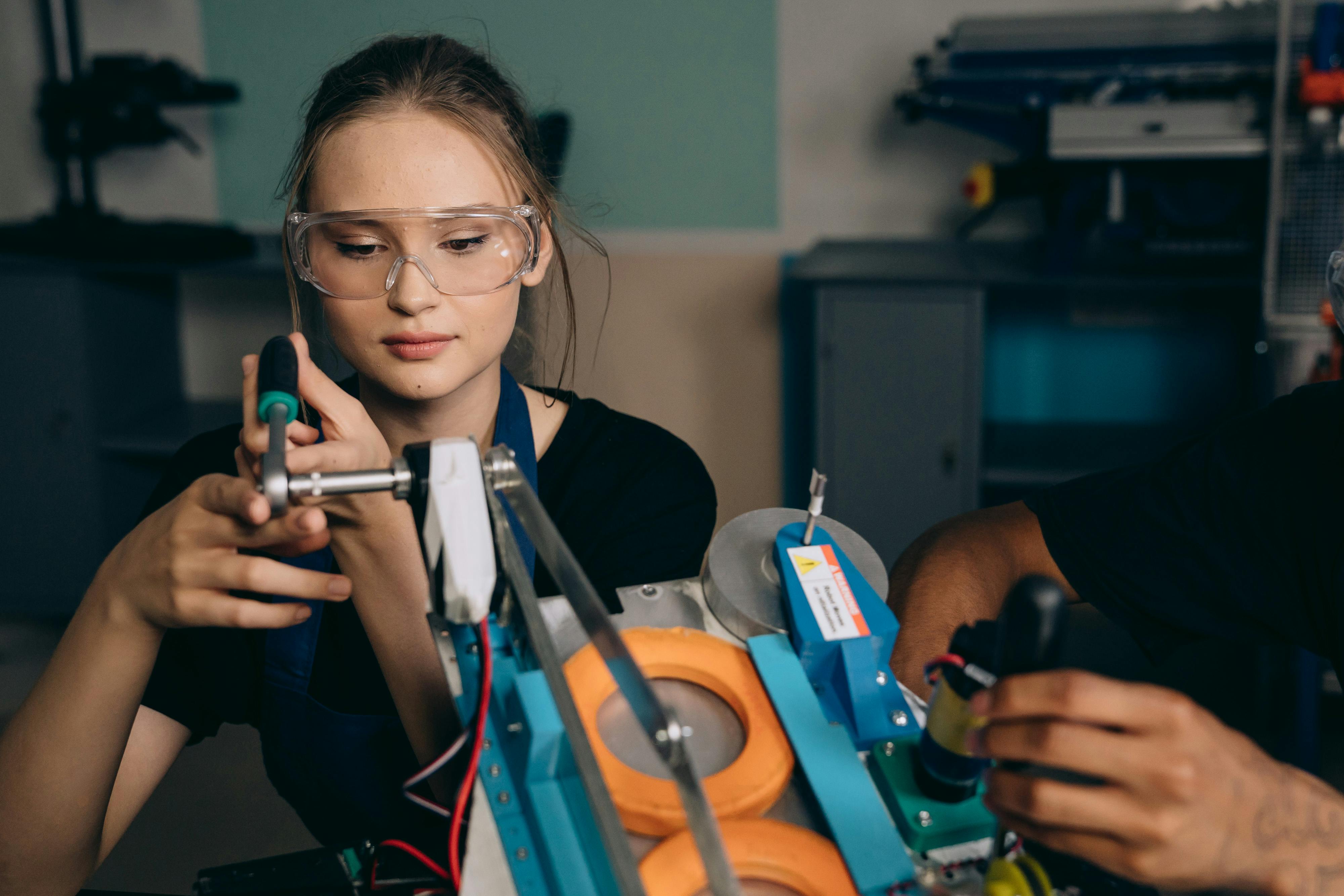 a woman wearing safety glasses