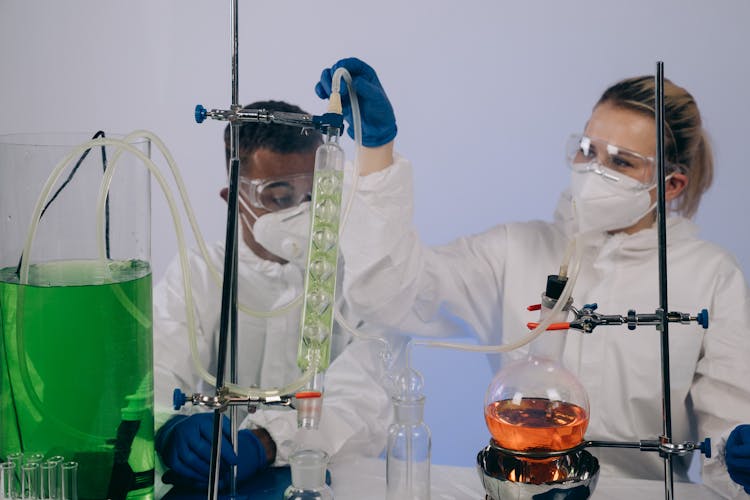 Chemists Doing An Experiment 