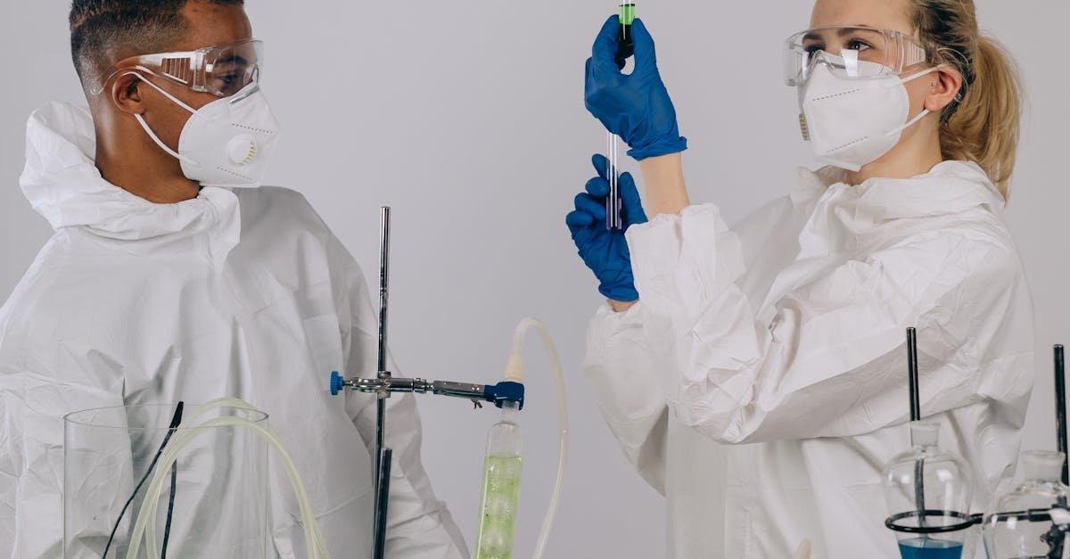 Chemists Wearing Personal Protective Equipment Experimenting Inside the ...