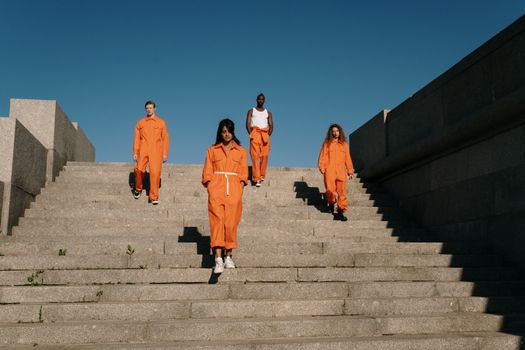 A Group of Prisoners Standing on the Stairs