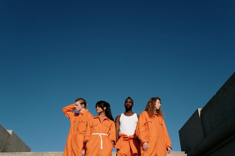 A Group Of Prisoners Standing