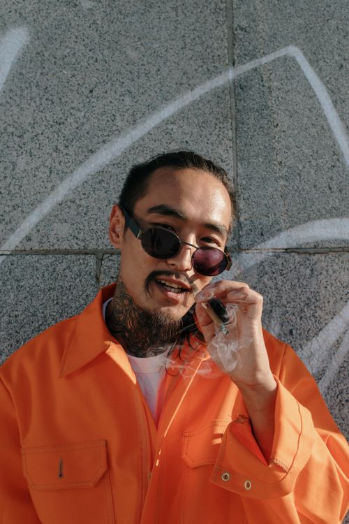 cigarette jumpsuit Man in Orange Jumpsuit Smoking a Cigarette · Free Stock Photo cigarette jumpsuit Man in Orange Jumpsuit Smoking a Cigarette · Free Stock Photo