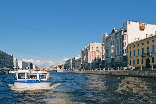 Free A Ferry Boat Sailing on the River Stock Photo