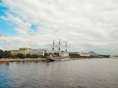Sailing Ship and City Waterfront 