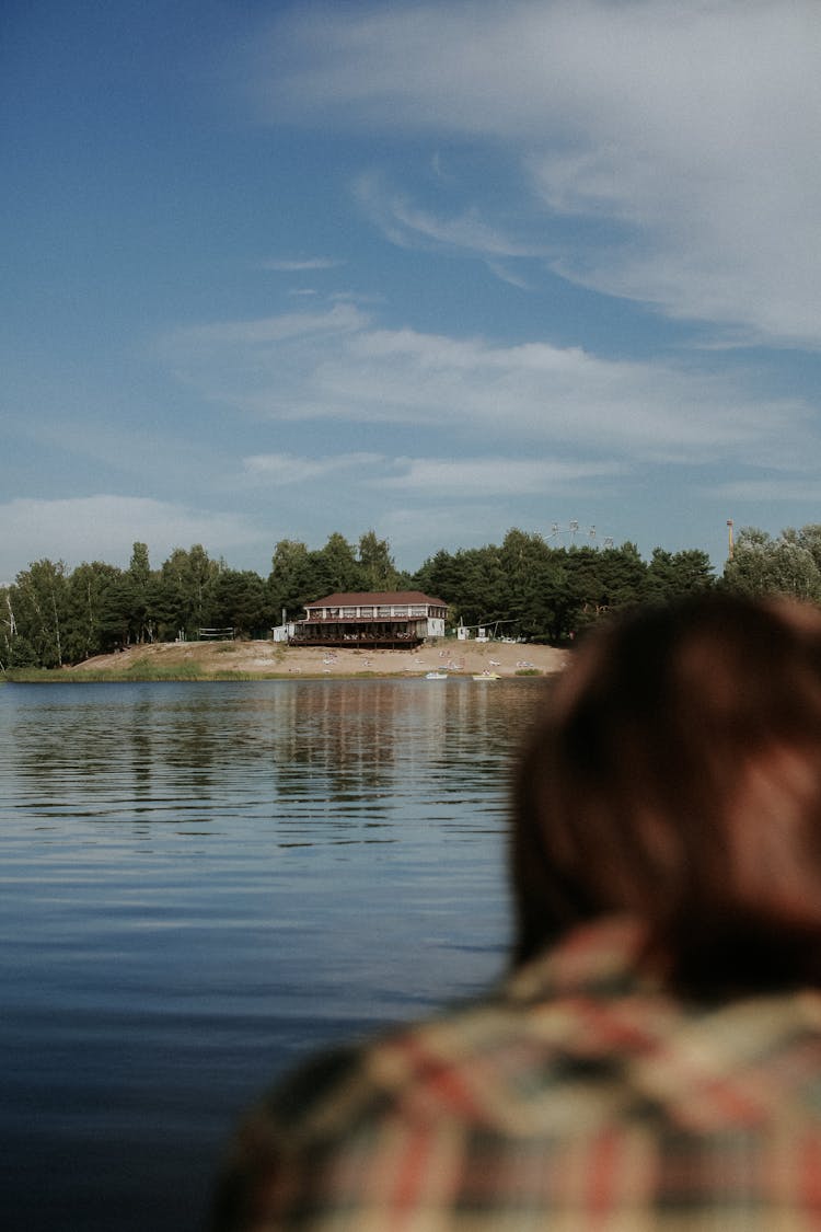 Lake And Beach With House