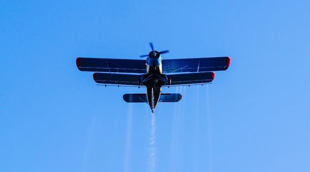 Black and Red Plane Flying in the Sky
