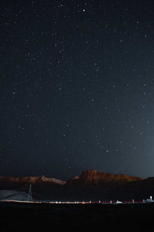 Brown Mountain Under Starry Sky