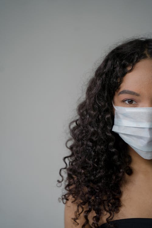 Woman Wearing White Face Mask