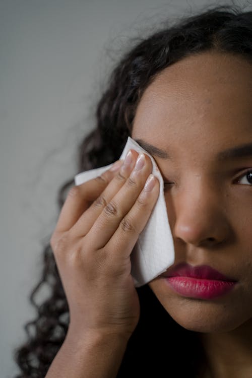 Woman Wiping her Eye