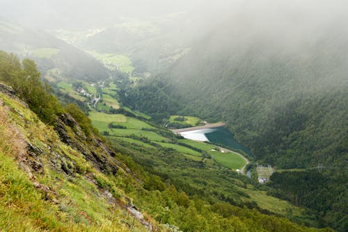 Aerial View of a River Surrounded by Mountains