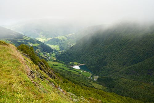 Aerial View of a River Surrounded by Mountains