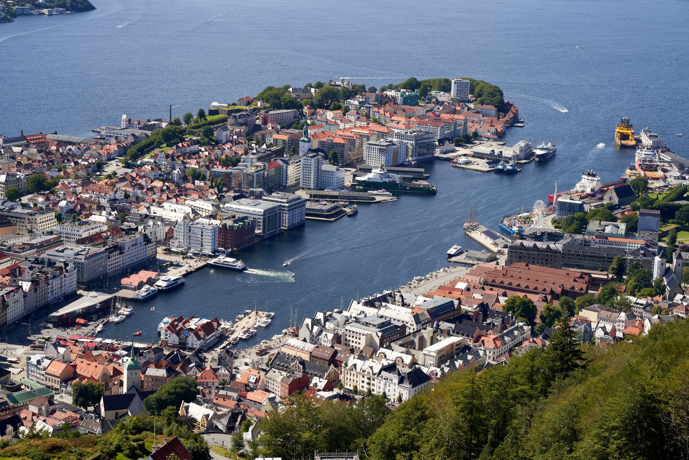 Stunning aerial view of Bergen, Norway, showcasing the city's harbor and surrounding architecture.