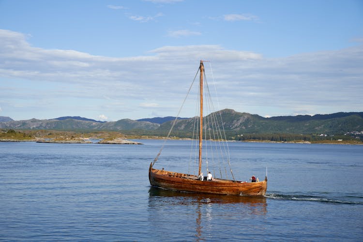 Sailors In Wodden Sailboat