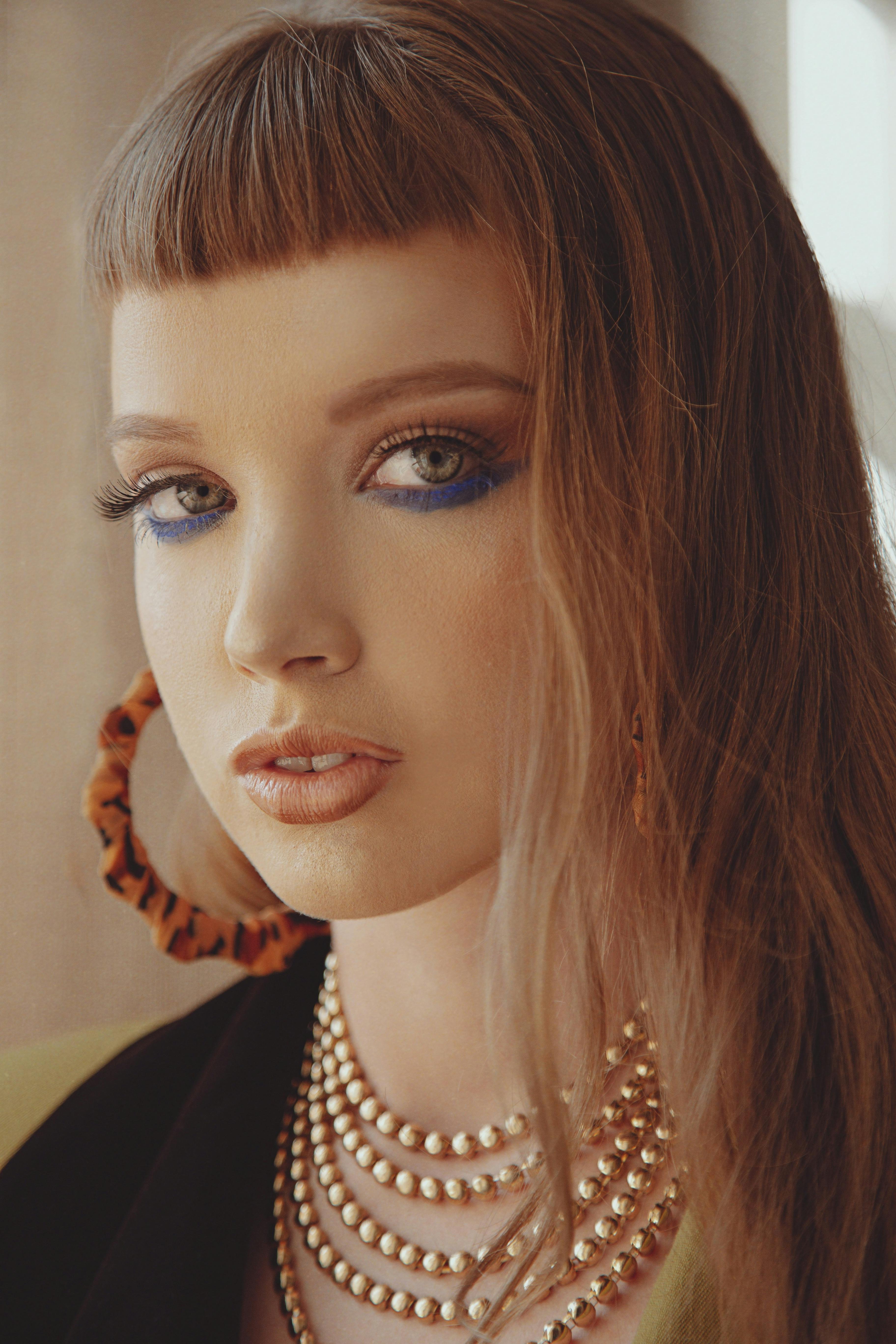 De franc Foto d'estoc gratuïta de accessoris, adorable, arracada de cèrcol Foto d'estoc